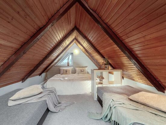 Schlafen in der Ferienwohnung auf Fehmarn im Reetdach-Häuschen